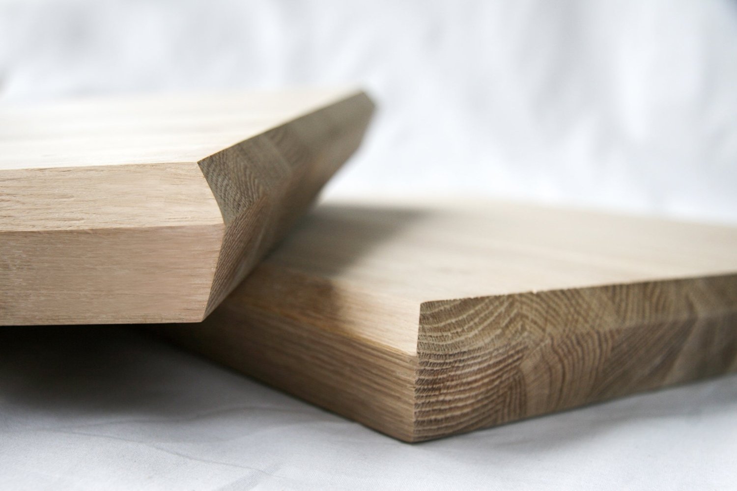 Wooden chopping board with thick corner block and angled cut