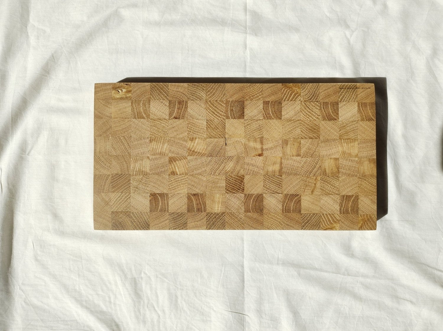 Wooden cutting board rectangle with patchwork pattern and smooth rounded corners